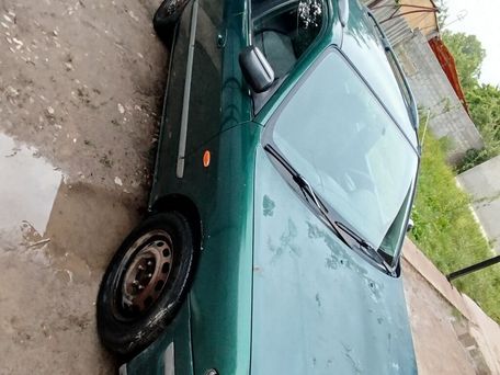 Mazda 323, 1998 — photo 3