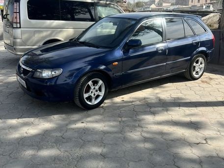 Mazda 323, 2003 — сүрөт 1