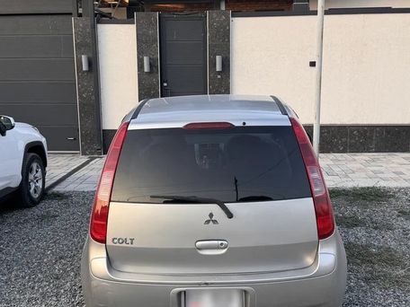 Mitsubishi Colt, 2003 — 照片 1