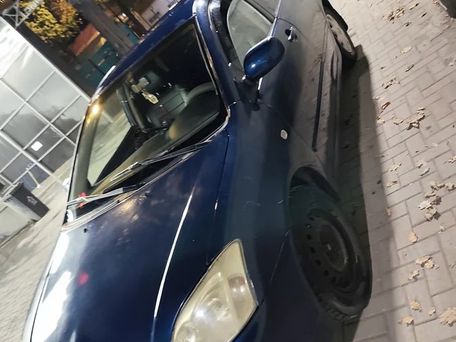 Toyota Corolla, 2003 — 照片 2