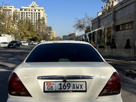 Nissan Bluebird, 2003 — photo 2