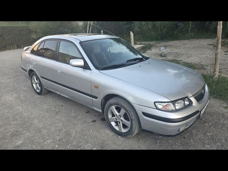 Mazda Familia, 1998 — photo 5