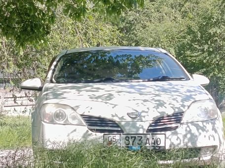 Nissan Primera, 2002 — 照片 2