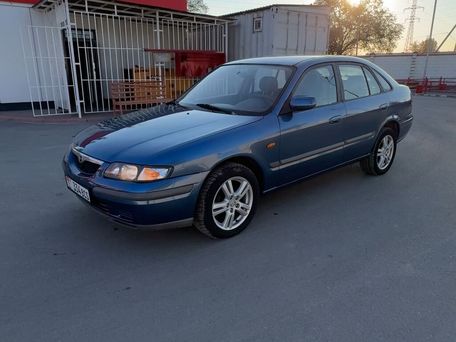 Mazda 626, 1997 — 照片 1