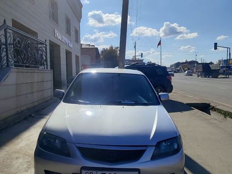Mazda Familia, 2002 — 照片 1