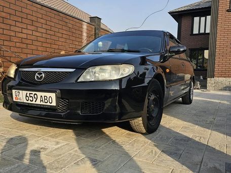 Mazda 323, 2001 — photo 2
