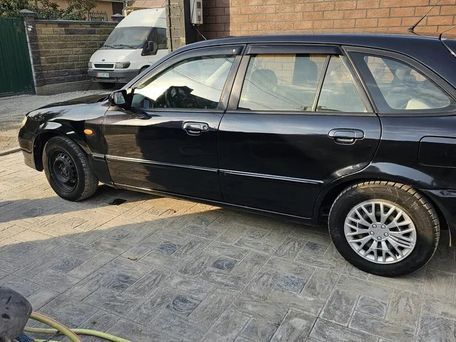 Mazda 323, 2001 — photo 1