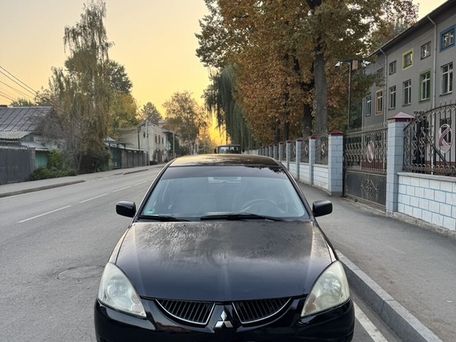 Mitsubishi Lancer, 2004 — 照片 1