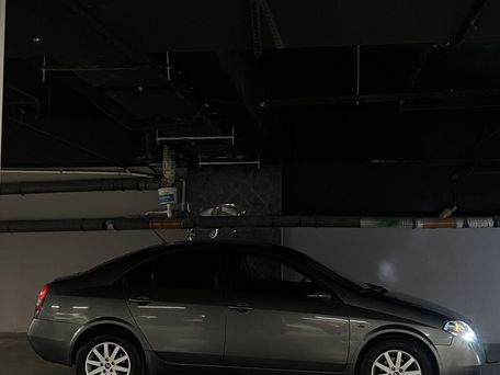 Nissan Primera, 2003 — 照片 2