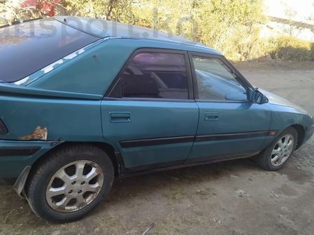 Mazda 323, 1994 — photo 4