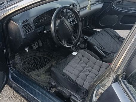 Mazda 323, 1997 — photo 4
