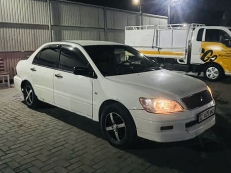 Mitsubishi Lancer, 2001 — сүрөт 4