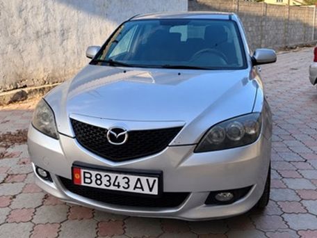 Mazda 3, 2004 — 照片 1