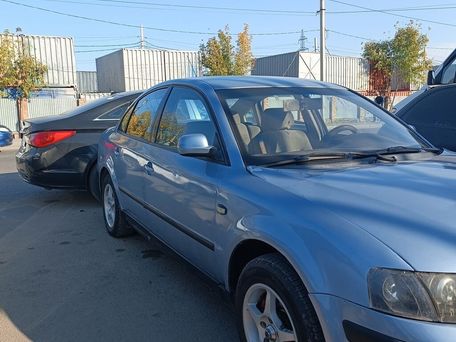 Volkswagen Passat, 1998 — 照片 1