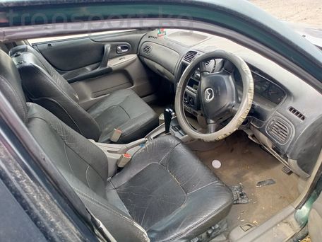 Mazda 323, 2001 — сүрөт 7