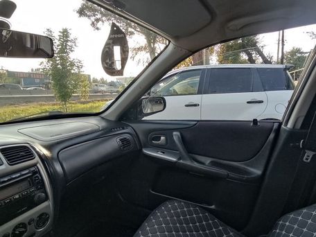 Mazda 323, 2002 — 照片 7