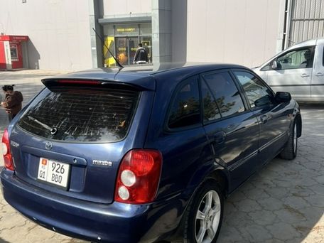 Mazda 323, 2003 — сүрөт 4