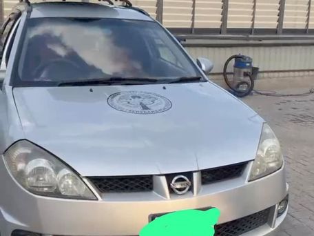 Nissan Wingroad, 2003 — 照片 1