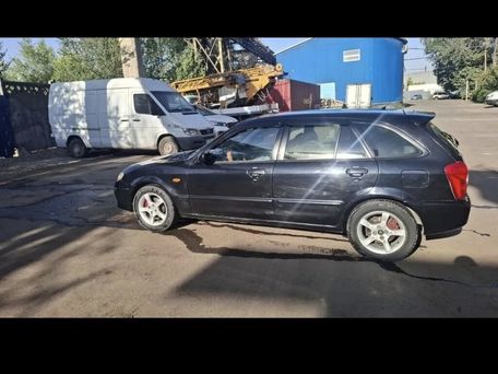 Mazda 323, 2003 — фото 3