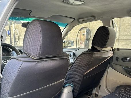 Mazda 323, 2001 — photo 10