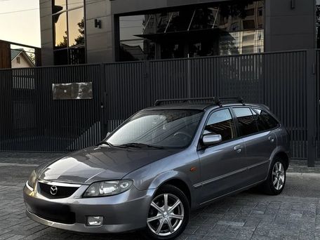 Mazda 323, 2003 — фото 1