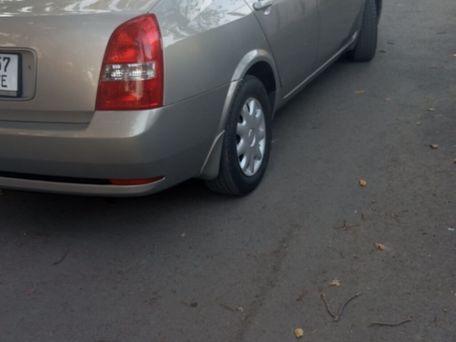 Nissan Primera, 2004 — 照片 5