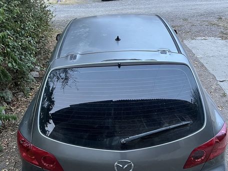 Mazda 3, 2003 — 照片 2