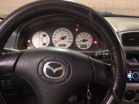 Mazda Familia, 2001 — photo 9