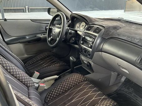 Mazda 323, 2001 — photo 4