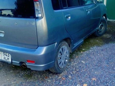 Nissan Cube, 1999 — photo 1