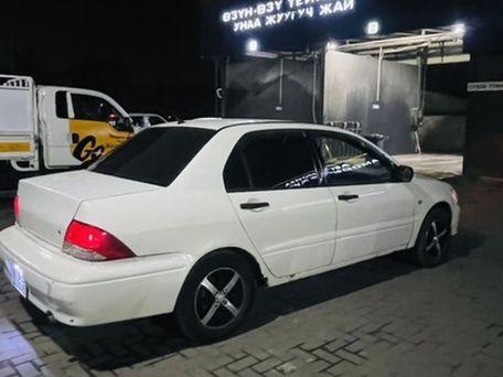 Mitsubishi Lancer, 2001 — сүрөт 5