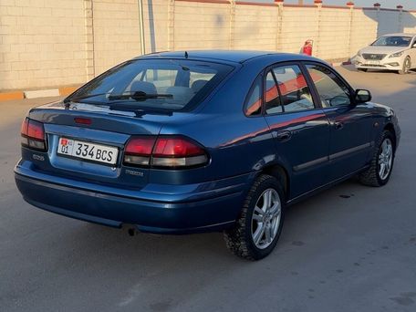 Mazda 626, 1997 — photo 4